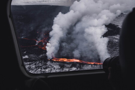 Plane flying over the Holuhraun lava field in Iceland in January 2015