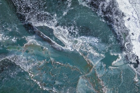 River Þjórsá on the south coast of Iceland in winter with frozen river banks