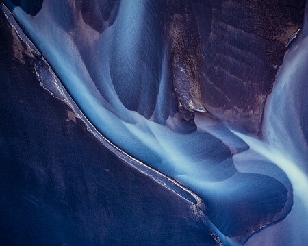 Abstract aerial photography of colorful glacier river in Iceland