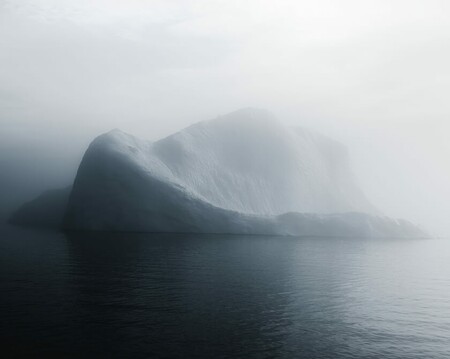 Icebergs in thick fog in the Disko Bay of Greenland