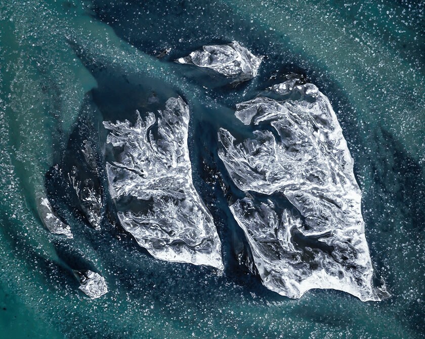 Glacier river Þjórsá on the south coast of Iceland in winter with ice floes and frozen over sand island