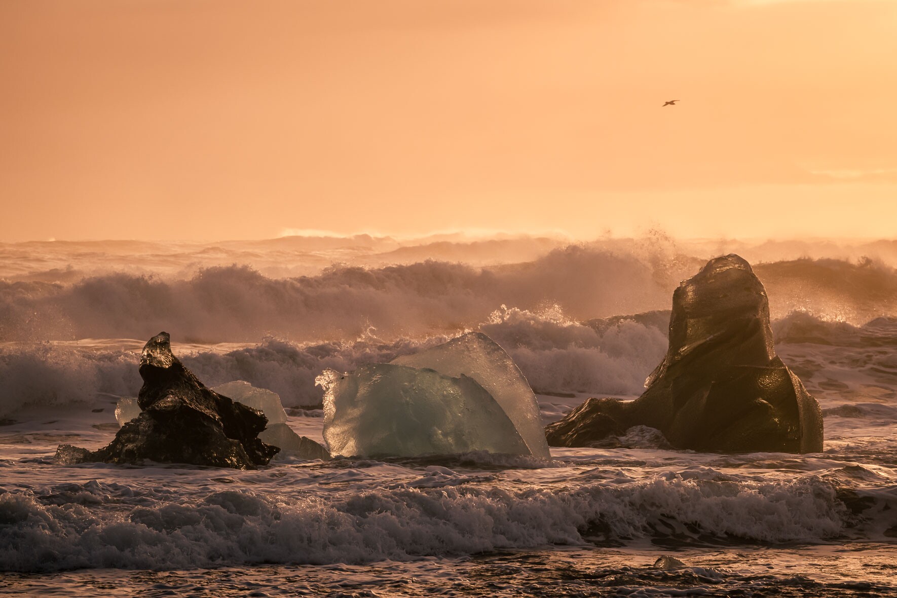 Diamond Beach near Jökulsárlón Glacier Lagoon with Icebergs at Sunset