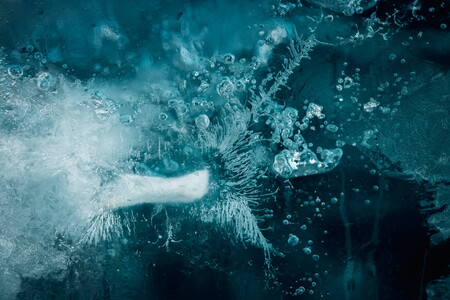 Abstract photograph of air bubbles trapped within the ice of Vatnajökull glacier in Iceland