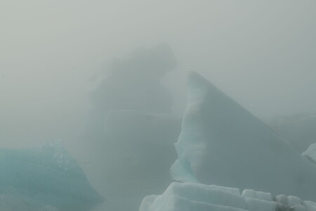 Icebergs in Jökulsárlón glacier lagoon (Iceland) surrounded by fog