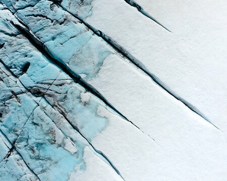 Aerial view of deep crevasses on a glacier in Norway