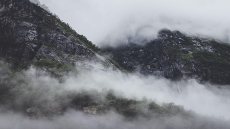 Clouds over the mountains near the small town Eidfjord, Norway