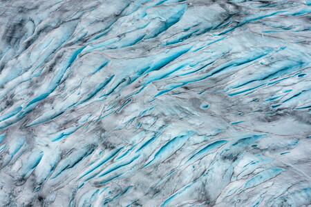 Jostedalsbreen glacier in Norway seen from above with deep crevasses