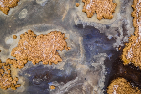 Surreal River Landscape of Iceland in Winter from Above with Ice and Snow