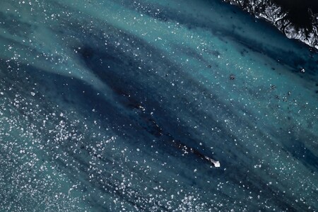 Aerial view of glacier river Þjórsá on the south coast of Iceland in winter with small ice floes