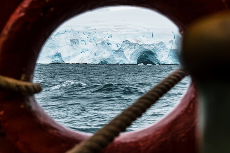 Tall ship Bark Europa and glacier landscape