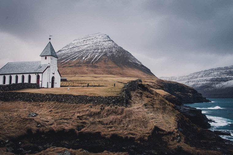 Dark and Moody Coastal Landscape with Church