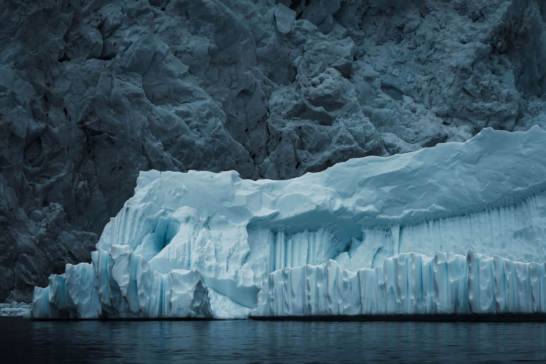 Iceberg with abstract shapes in Antarctica