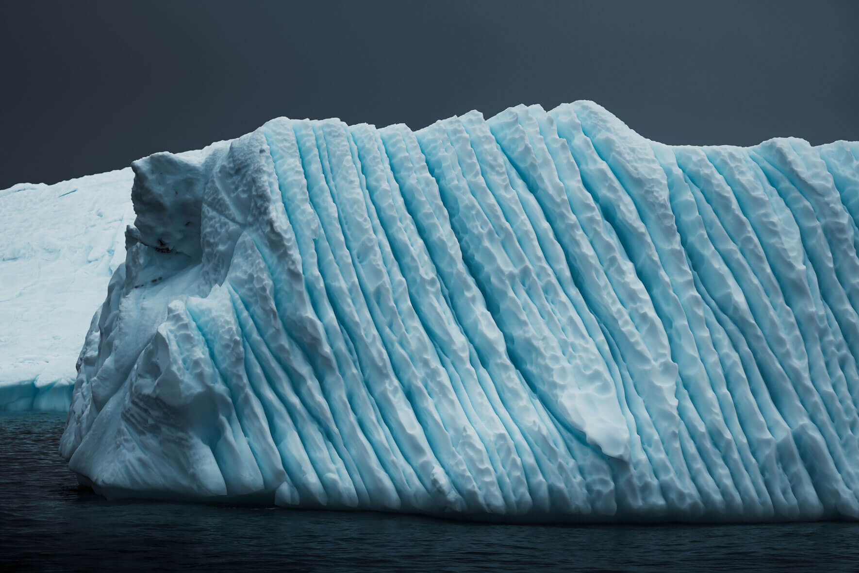 Iceberg with abstract shapes in Antarctica