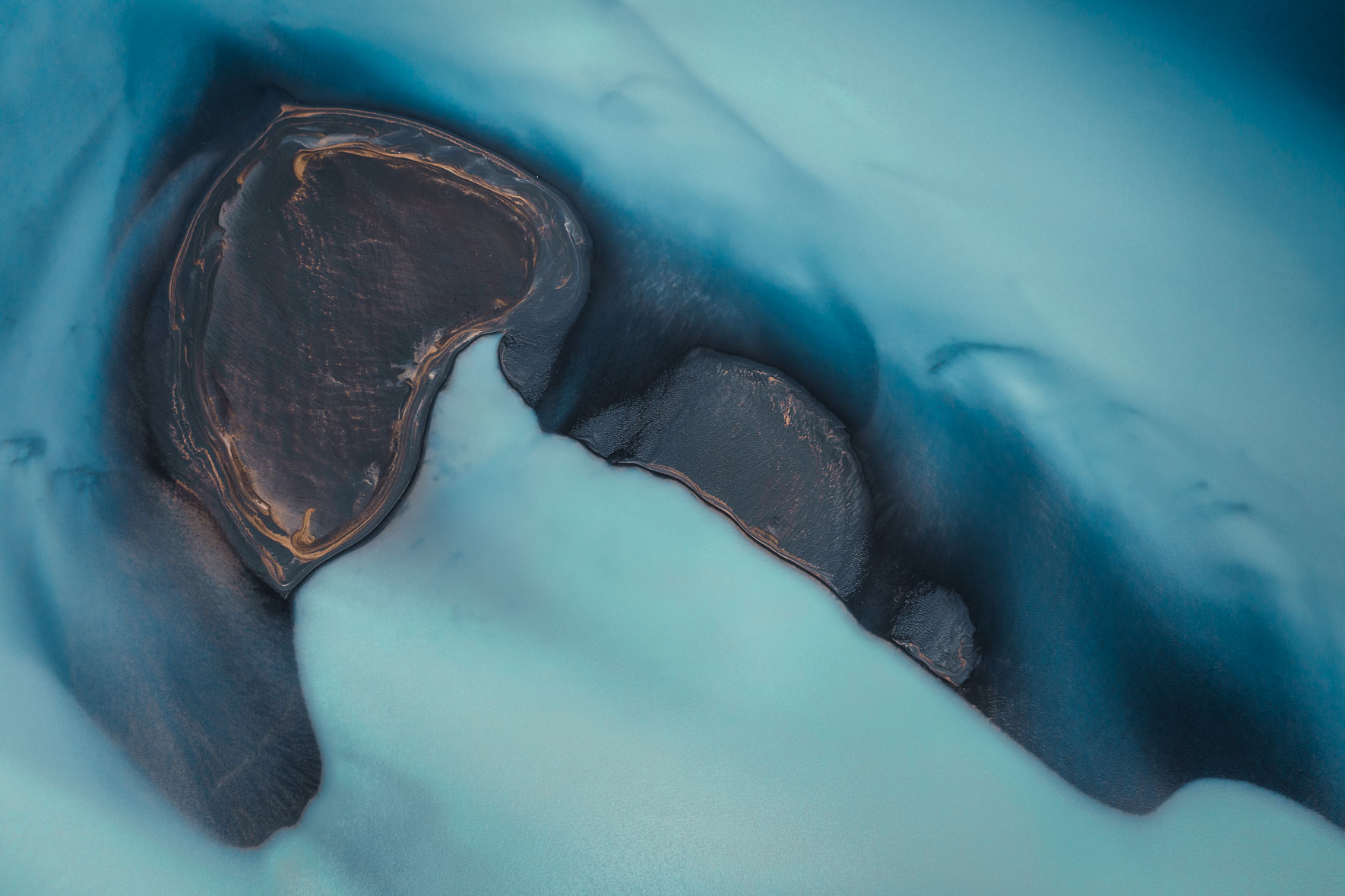 Abstract aerial photography of glacier river in Iceland