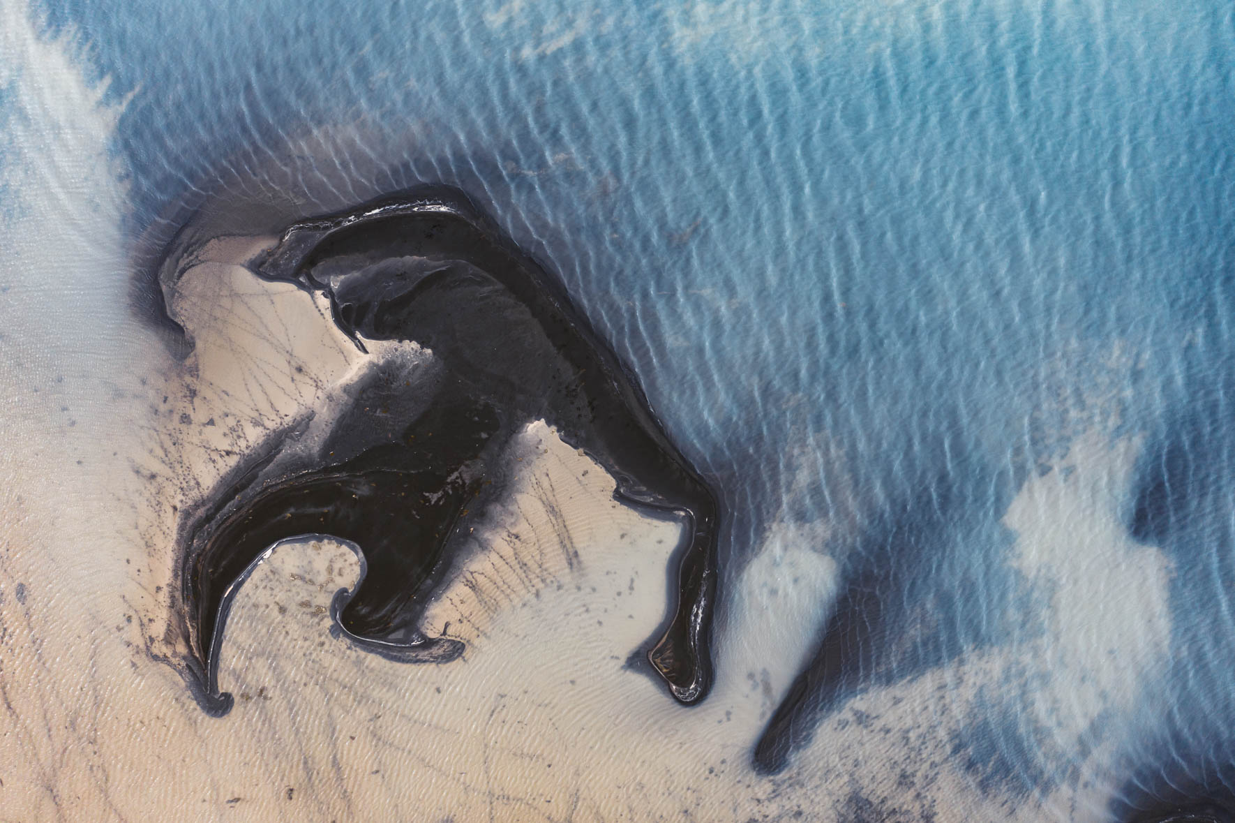 Aerial View of Abstract Mud Flats at Lake Sandvatn in Iceland