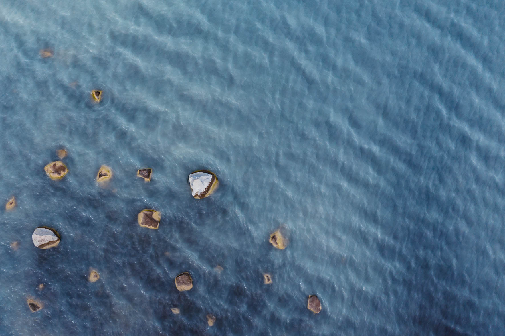 Aerial View of Lake with Rocks in Iceland