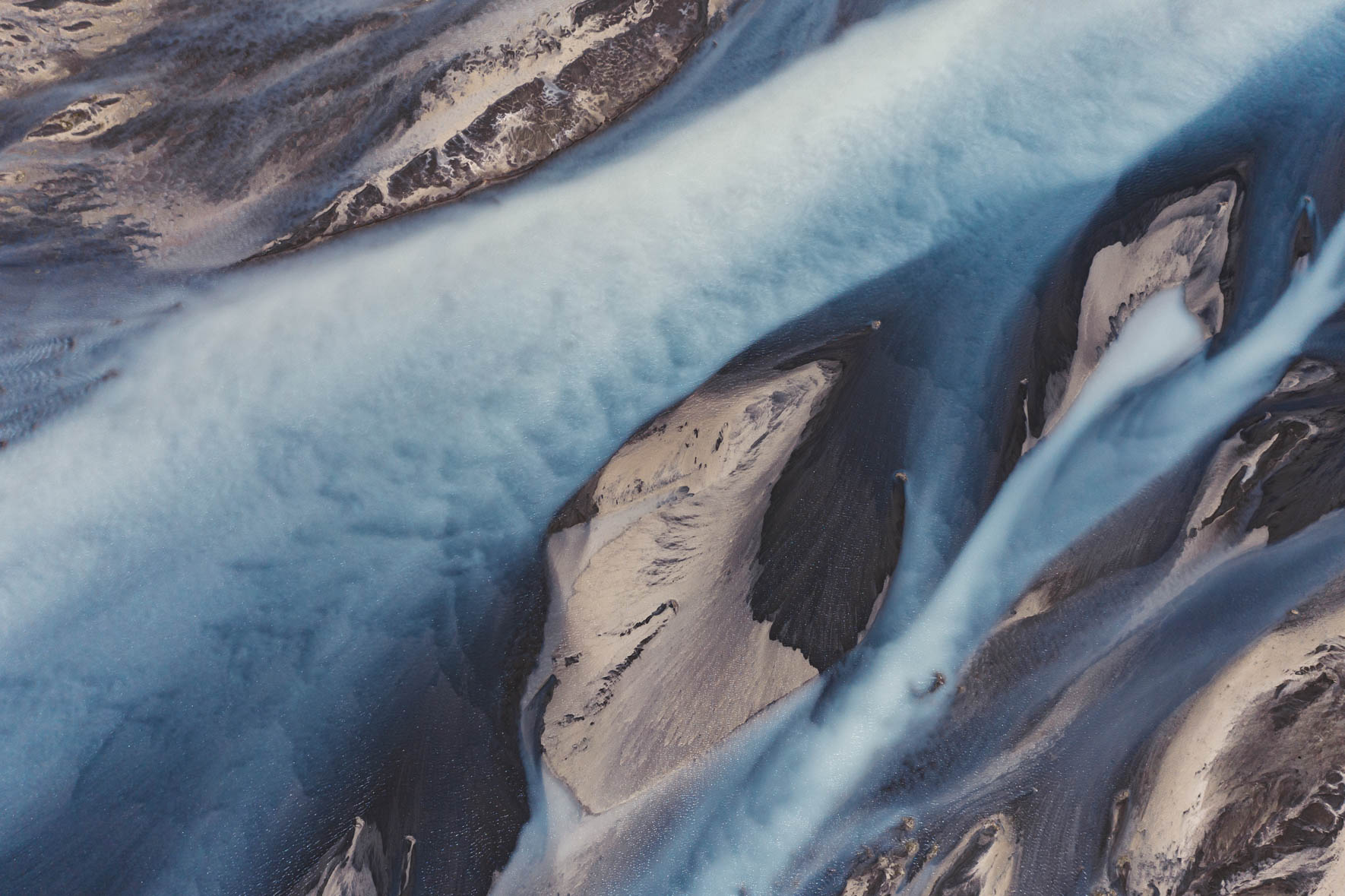 Abstract Aerial Photography of Glacier Rivers in Iceland by Northlandscapes