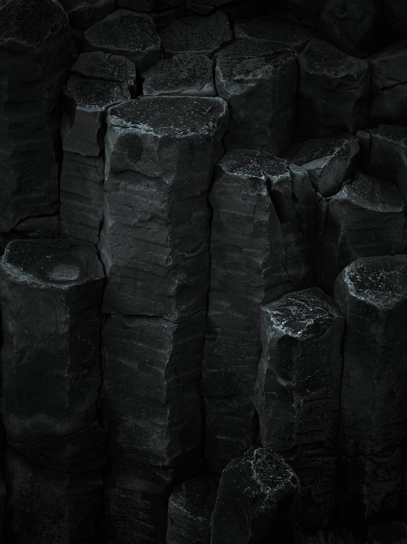 Abstract Patterns Formed by Hexagonal Basalt Rocks in Iceland