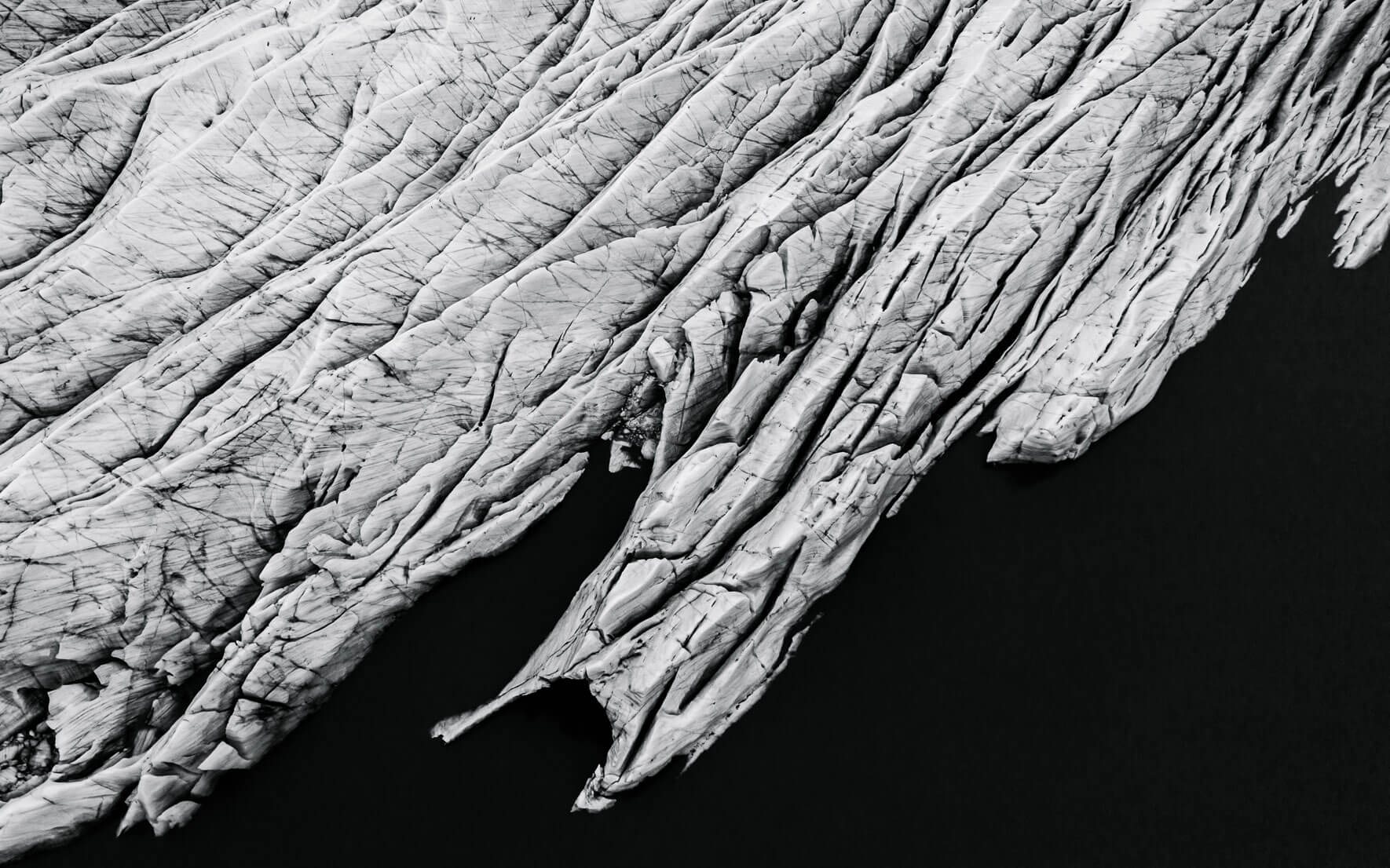 Aerial view of Svínafellsjökull glacier in Iceland in black and white