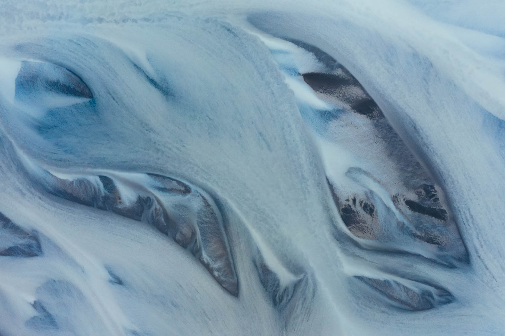 Abstract Aerial Photography of Glacial River in Iceland