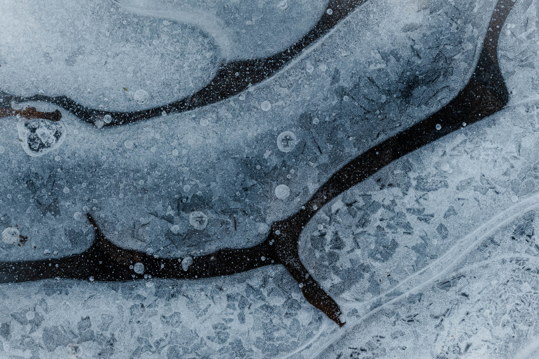 Abstract Winter Macro Photography of Frozen Puddle