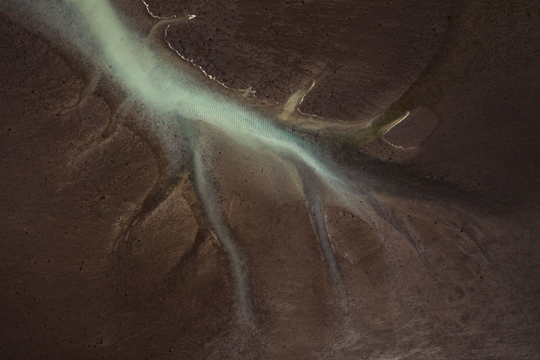 Tidal landscape on the south coast of Iceland with river veins