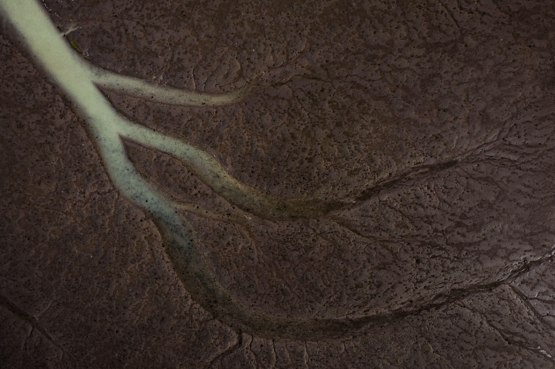 Abstract tidal landscape on the south coast of Iceland near the town of Höfn