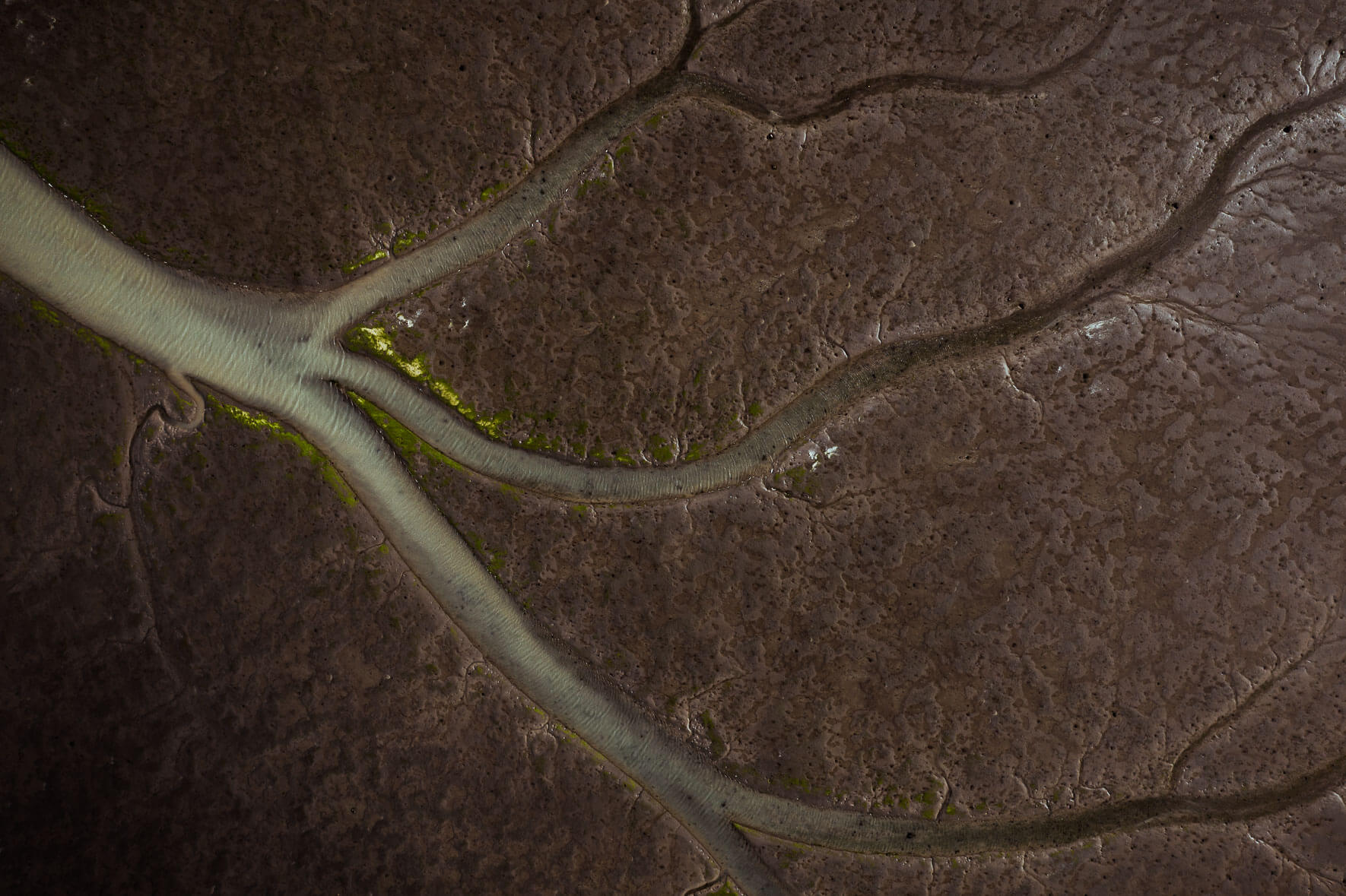 Aerial perspective of tidal landscape on the south coast of Iceland with water channels