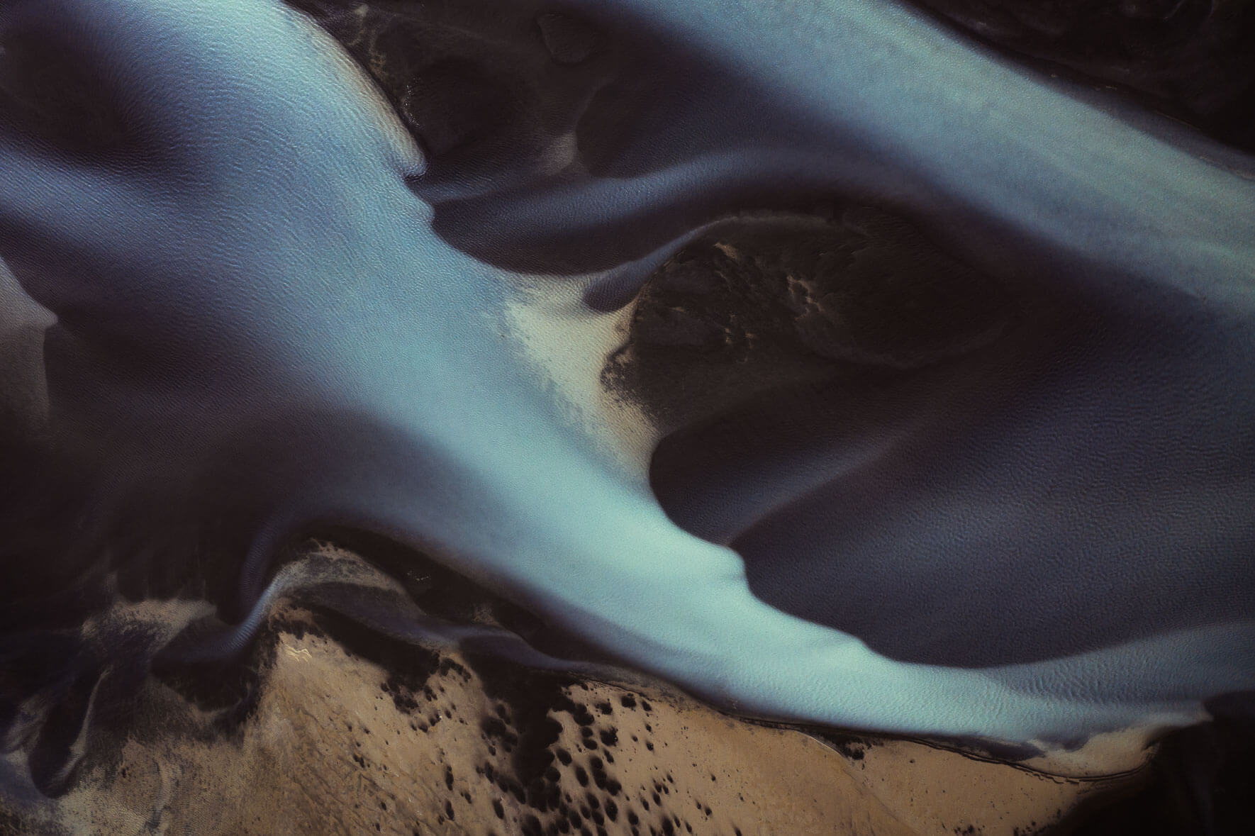 Abstract aerial view of tidal landscape on the south coast of Iceland