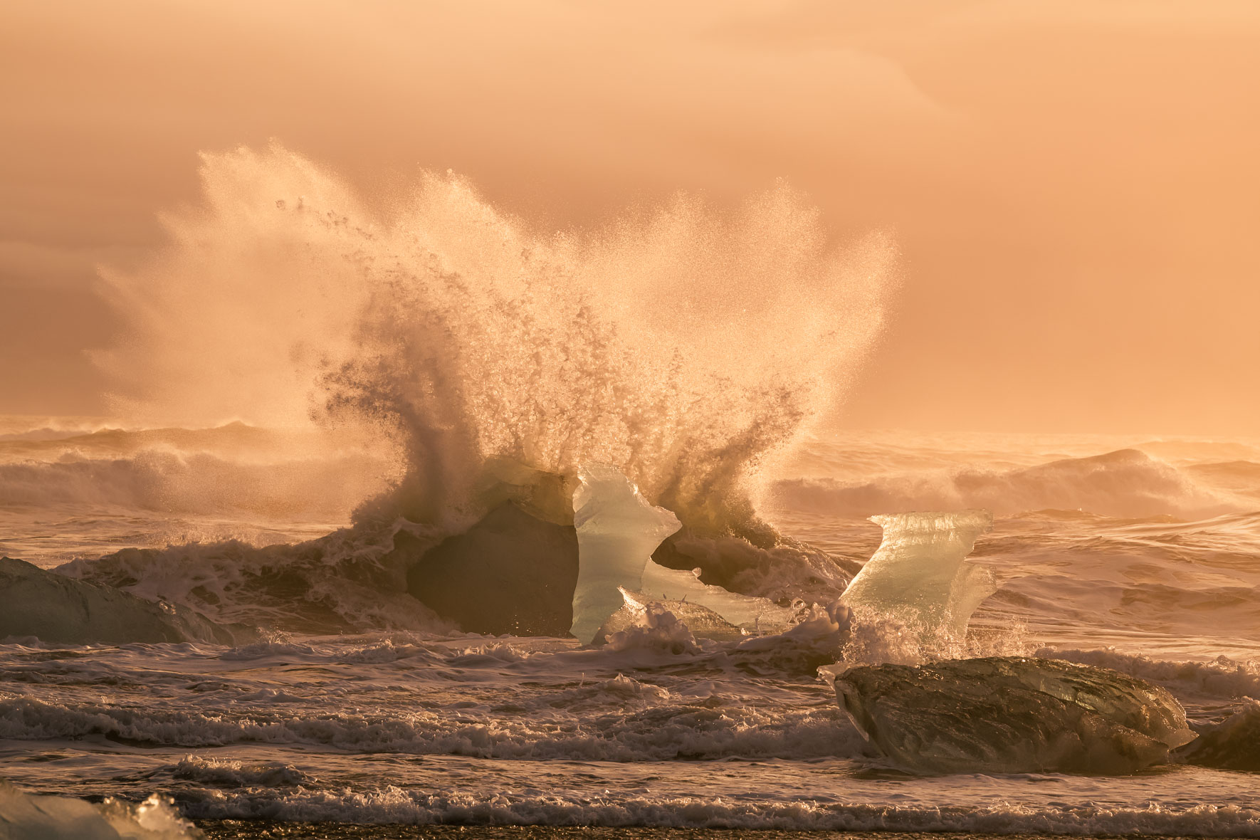 Crashing Waves at Diamond Beach in Iceland with Icebergs