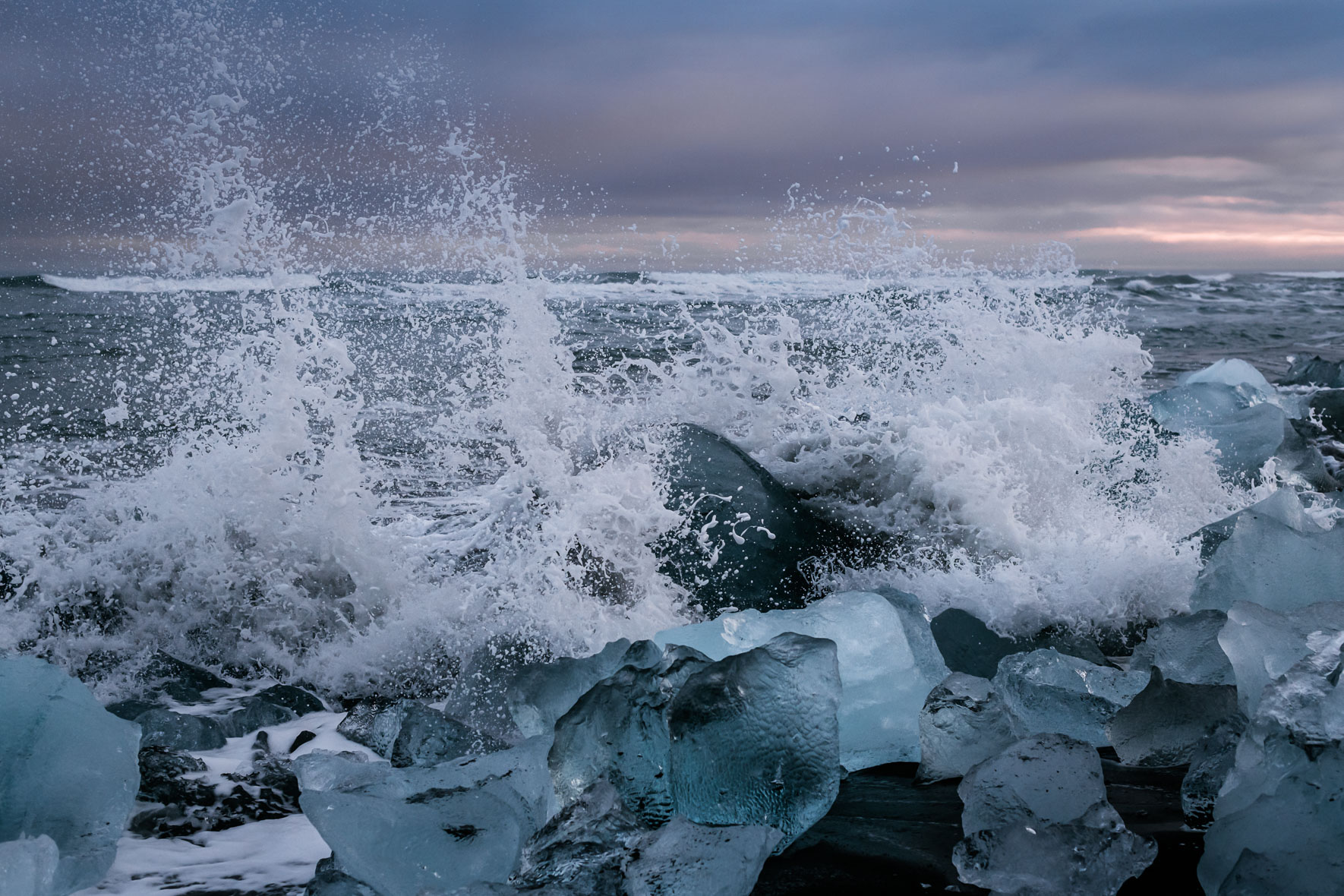 Crashing Waves at Icebergs near Jökulsárlón Glacier Lagoon in Iceland