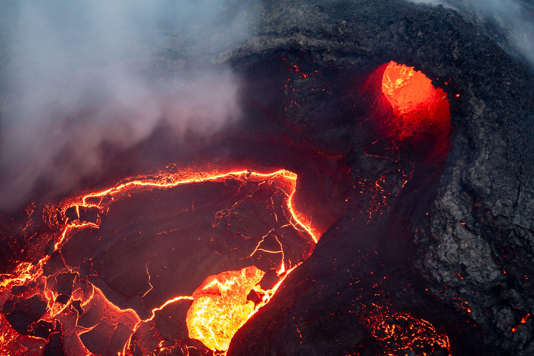 Aerial view of the crater of the Fagradalsfjall volcano in Iceland with cooling lava