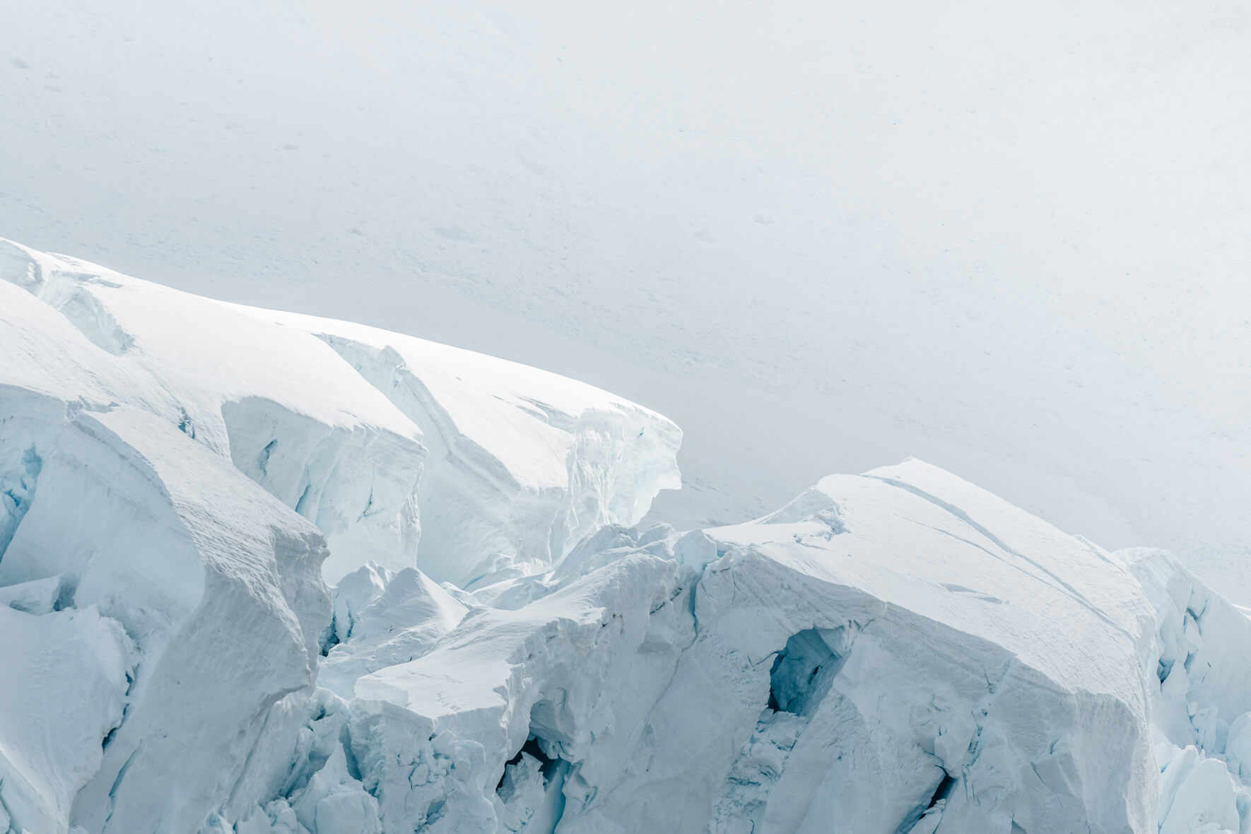 Abstract details of a glacier in Antarctica in bright sunlight