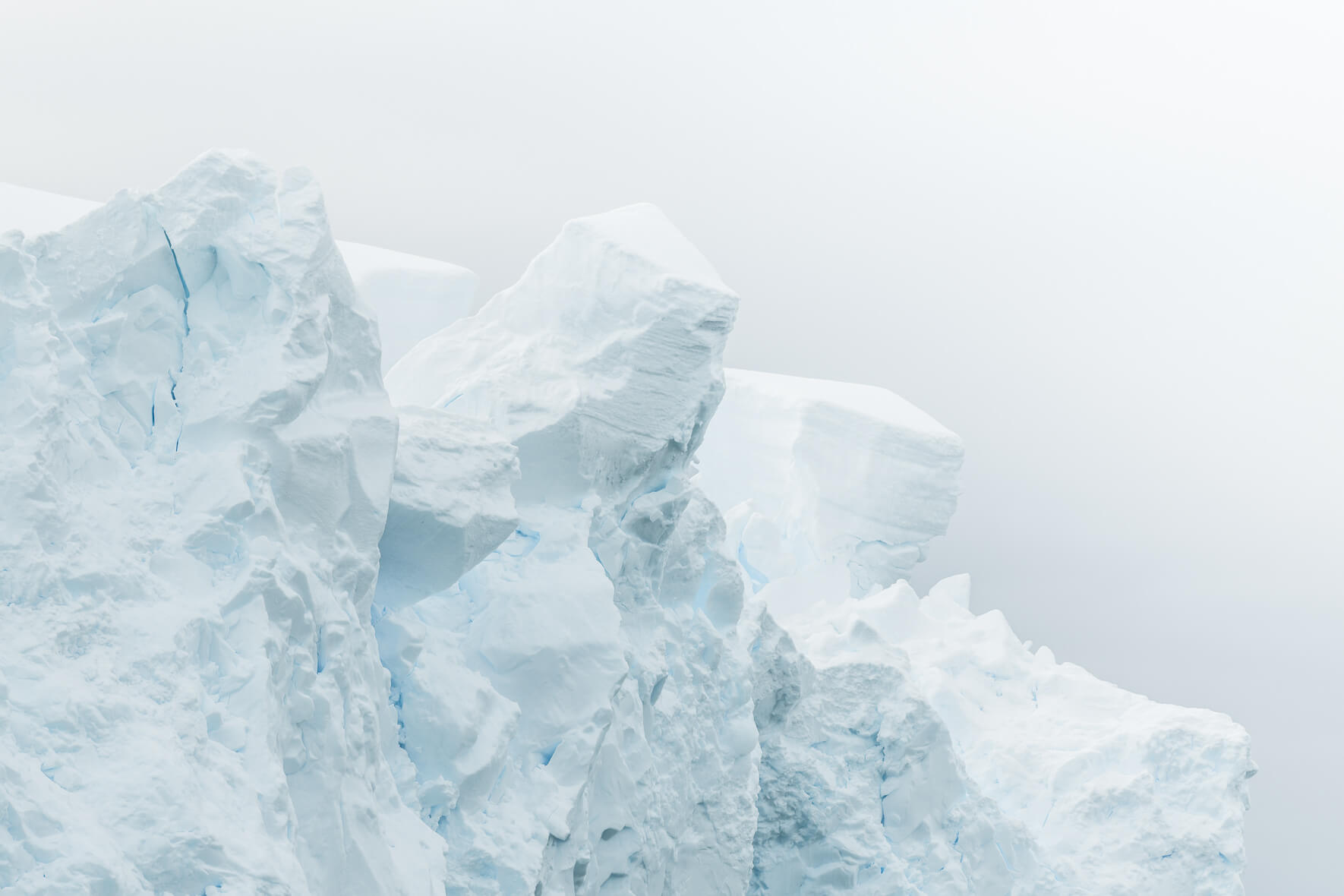 Glacier towers in Antarctica in bright sunlight