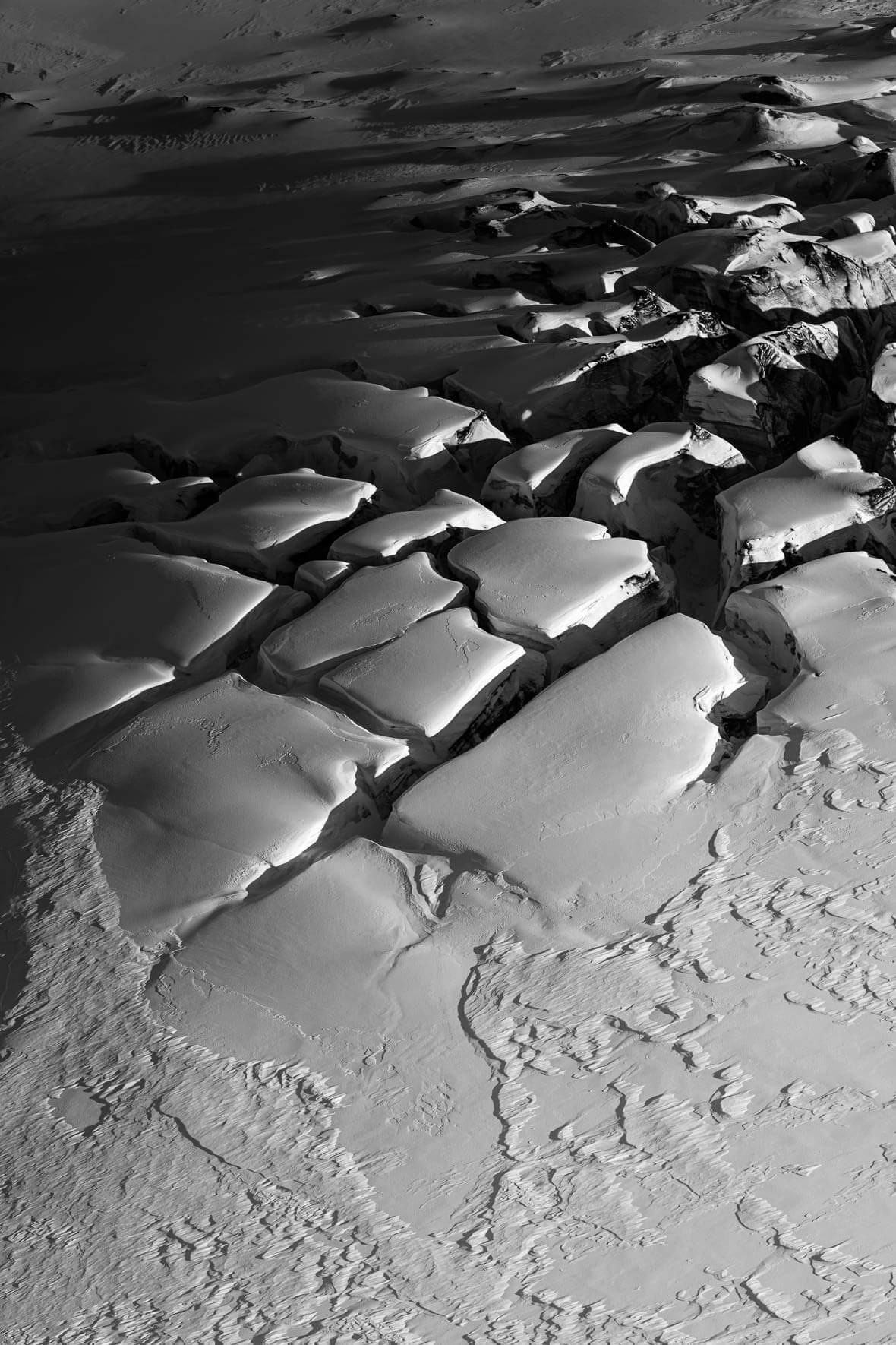 Black and white photo of crevasses of Mýrdalsjökull glacier in Iceland