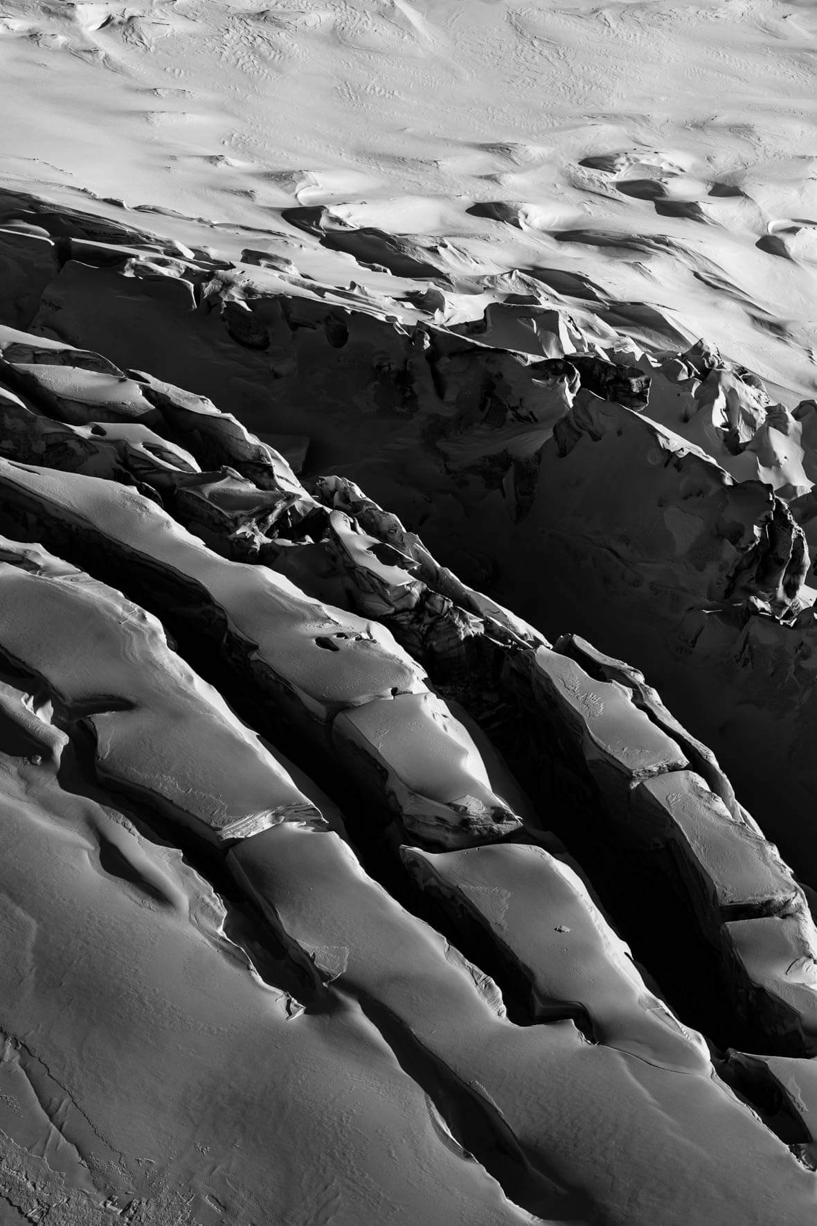 Black and white photograph of crevasses in Mýrdalsjökull glacier in Iceland