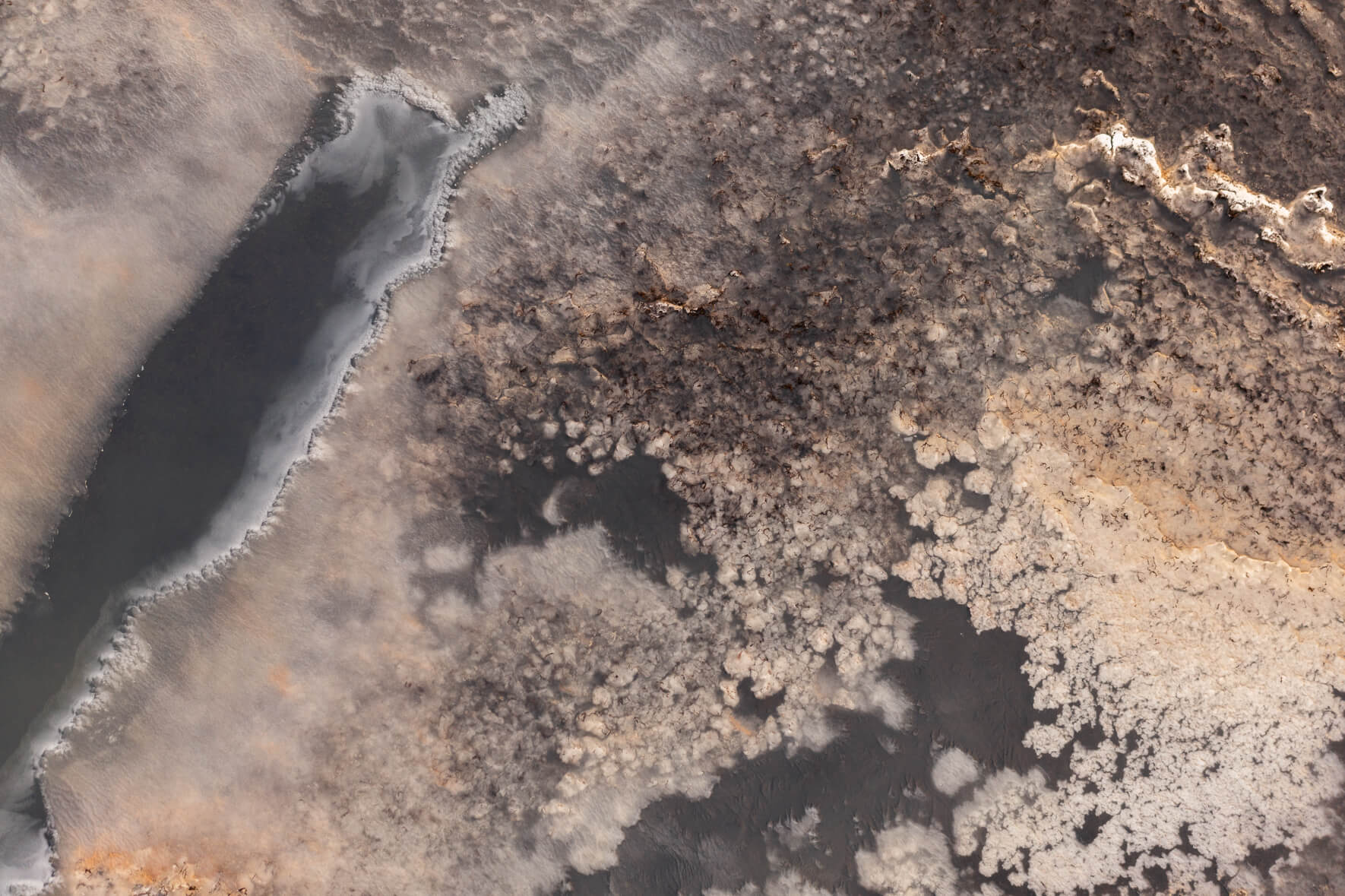 Aerial photo of frozen ponds on Jökuldalsheiði plateau in eastern Iceland