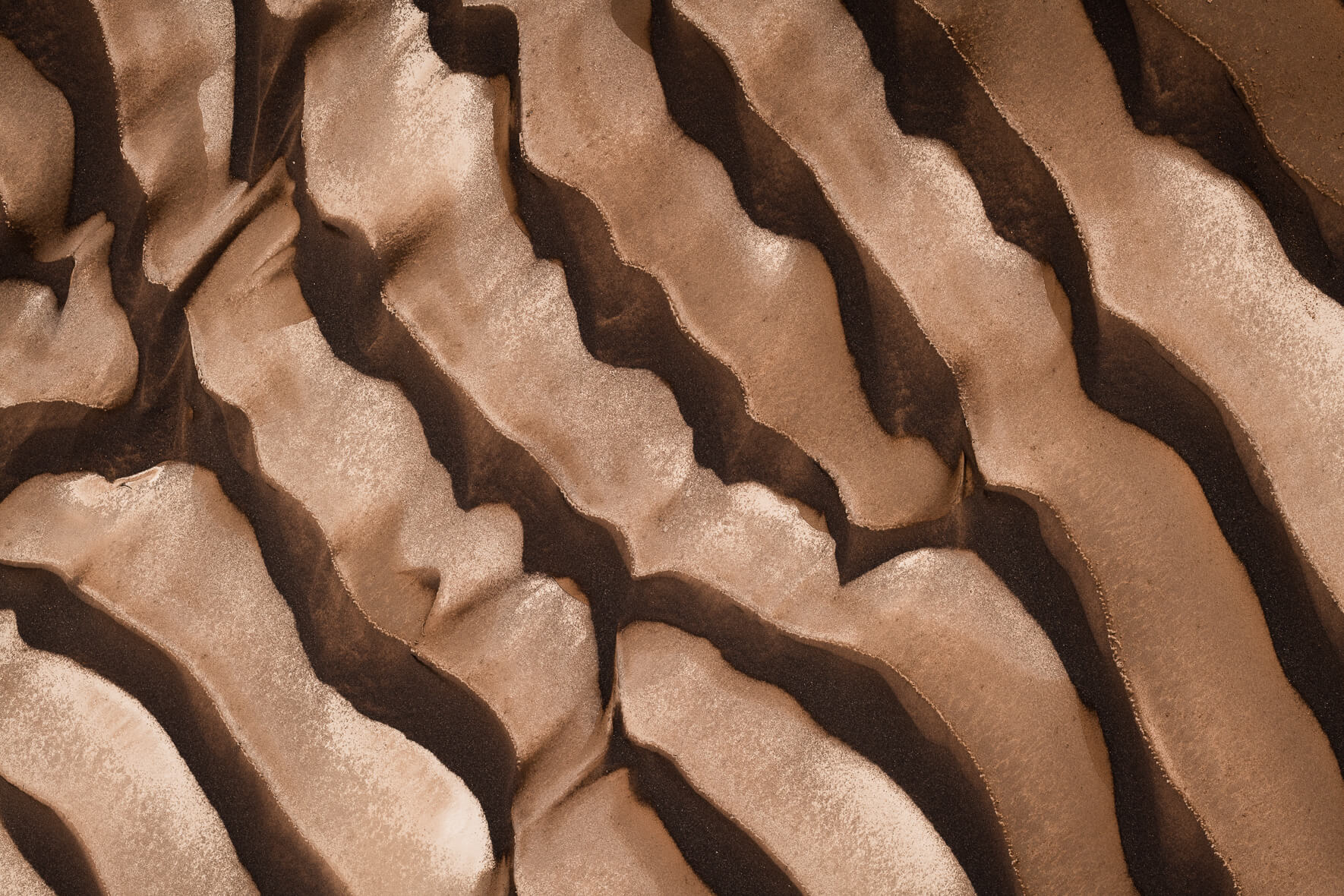 Abstract texture of dark and light sand in the highlands of Iceland