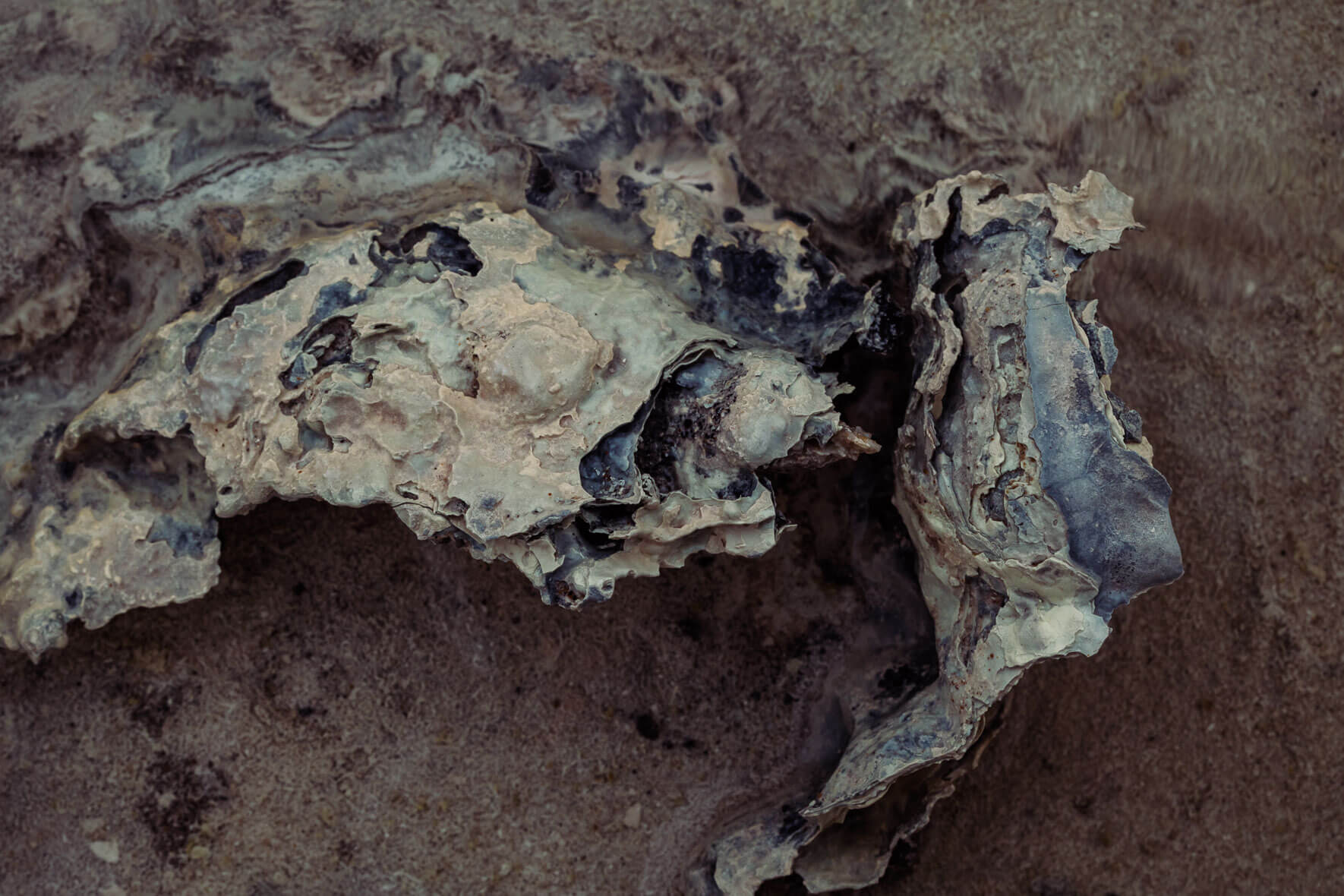 Abstract photography of a stream bed of a geothermal area in Mývatn region of Iceland