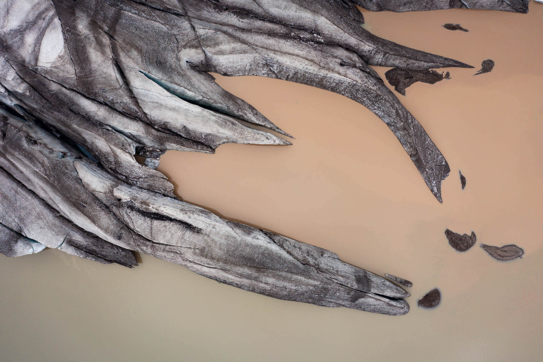 Aerial photography of Fláajökull glacier in Iceland with glacial lake