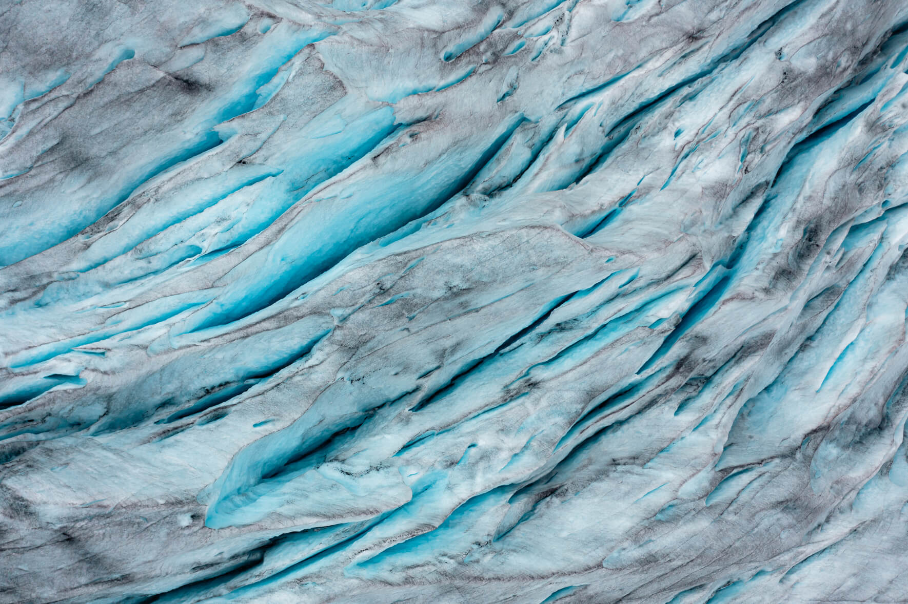 Drone view of deep crevasses in Jostedalsbreen glacier in Norway