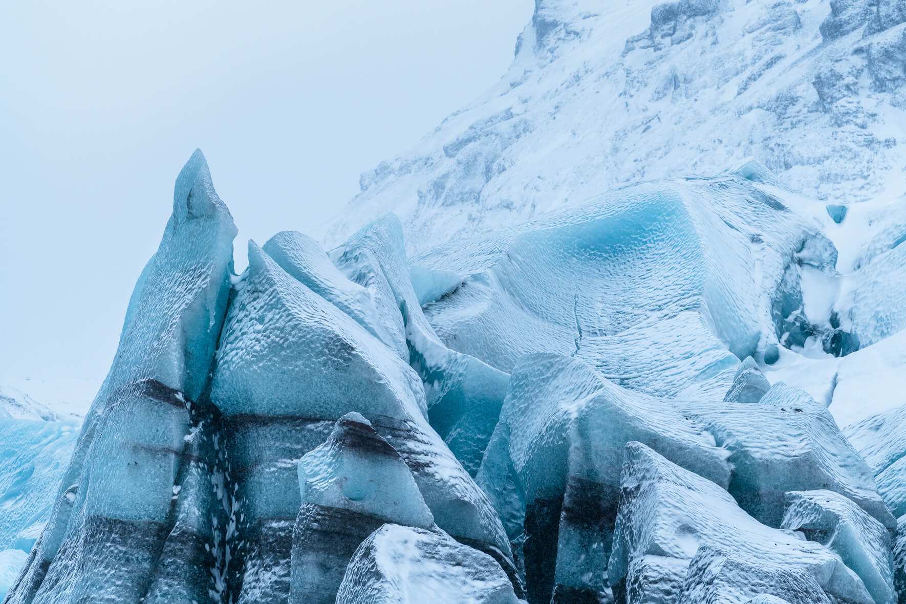 Details of Svínafellsjökull glacier in Iceland covered with fresh snow