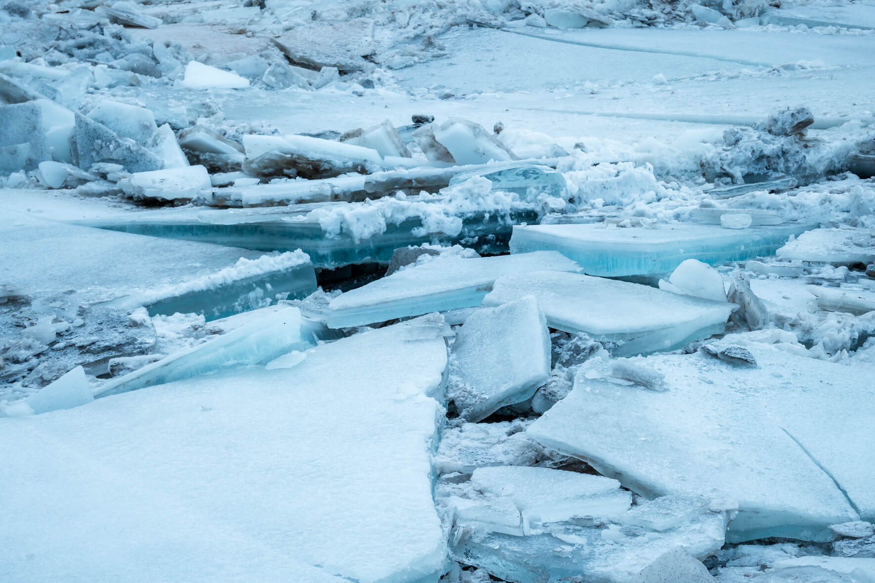 Ice floes piled on top of each other on a river on the south coast of Iceland