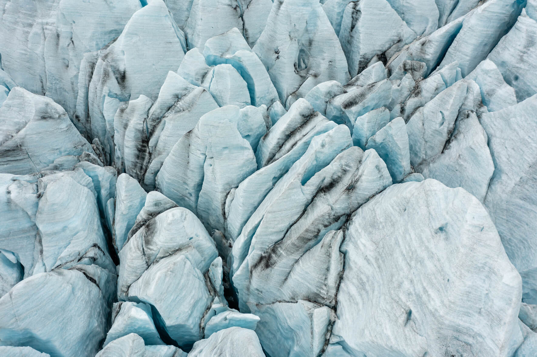 Aerial photograph of Fjallsjökull glacier (Öræfajökull) in Iceland with crevasses