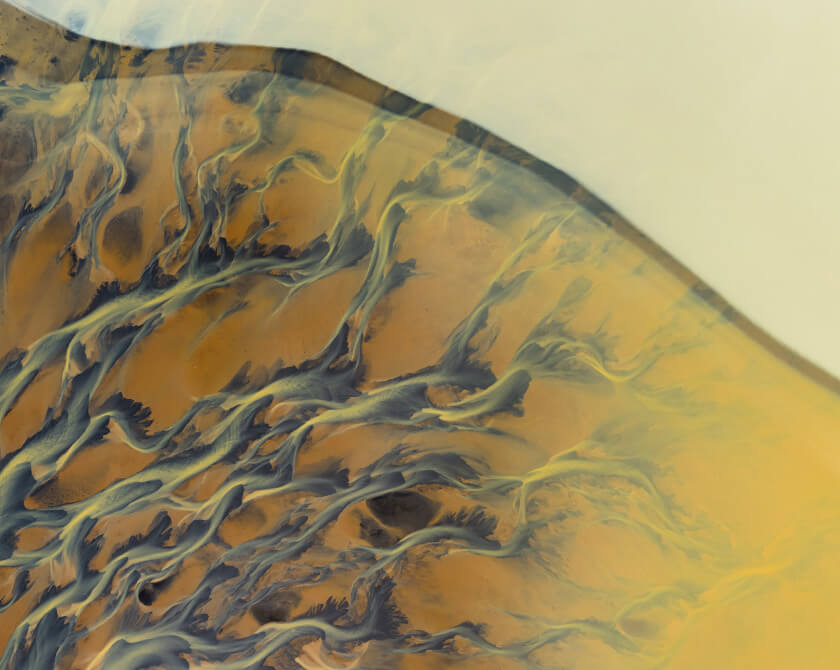 Aerial view of sulphur-rich river delta in Iceland