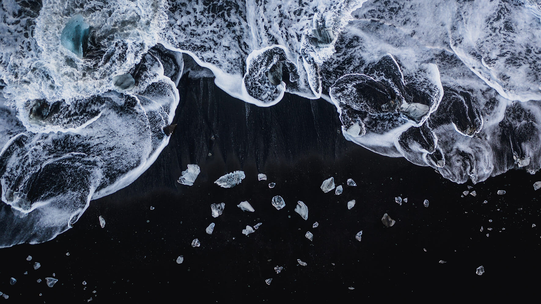 Black sand beach with icebergs in Iceland