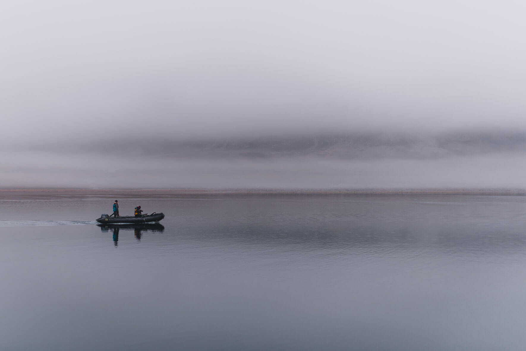 Zodiac boat in the waters of Svalbard