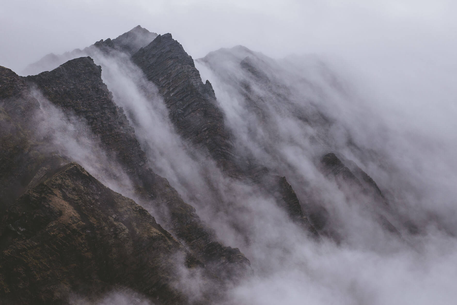 Clouds moving over mountain on Svalbard