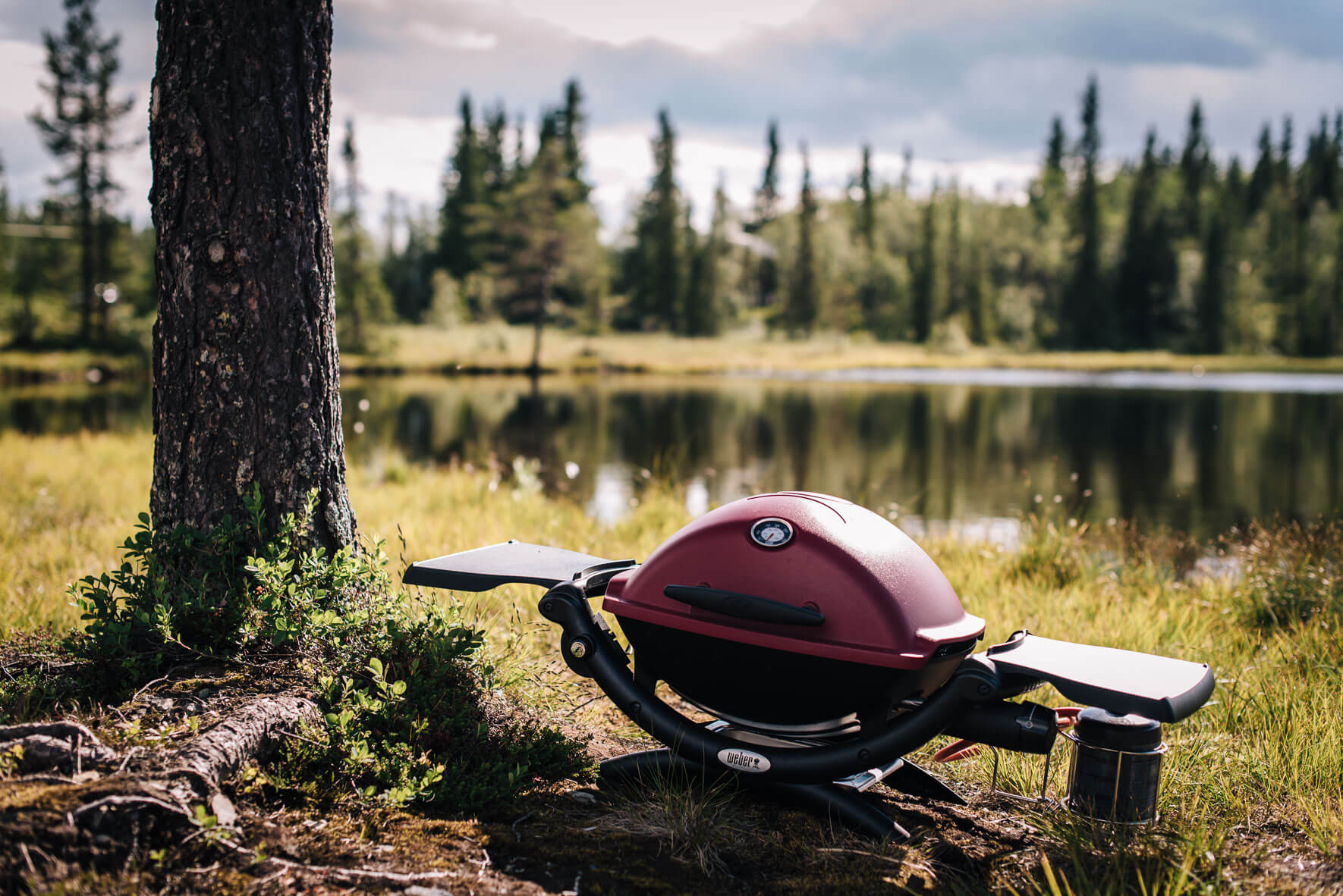 Weber Q 1200 grill in Norway with lake in the background