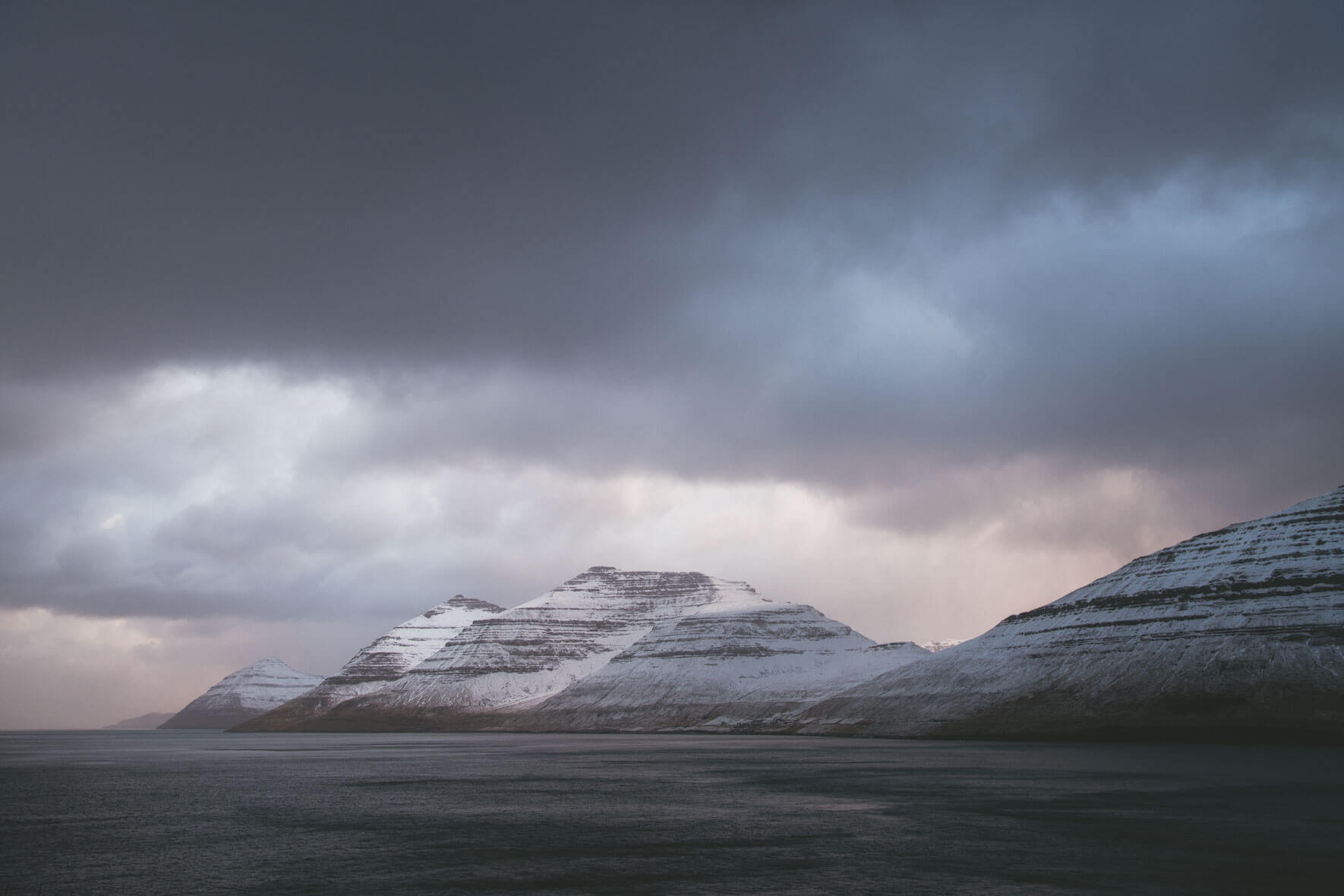 Dark clouds over the Faroe Islands in winter